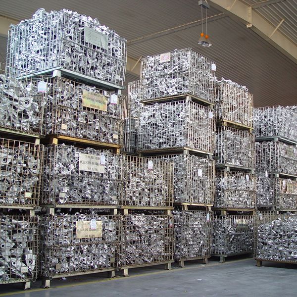 Several wire containers filled with hardware parts in the warehouse