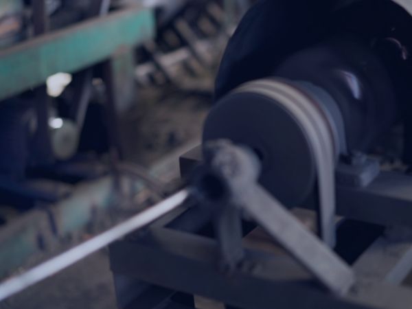 A wire straightening machine is straightening the steel wires.